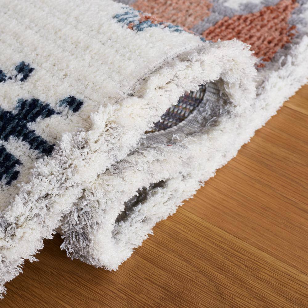 Ivory and Multicolor Geometric Wool and Synthetic 4' x 6' Area Rug