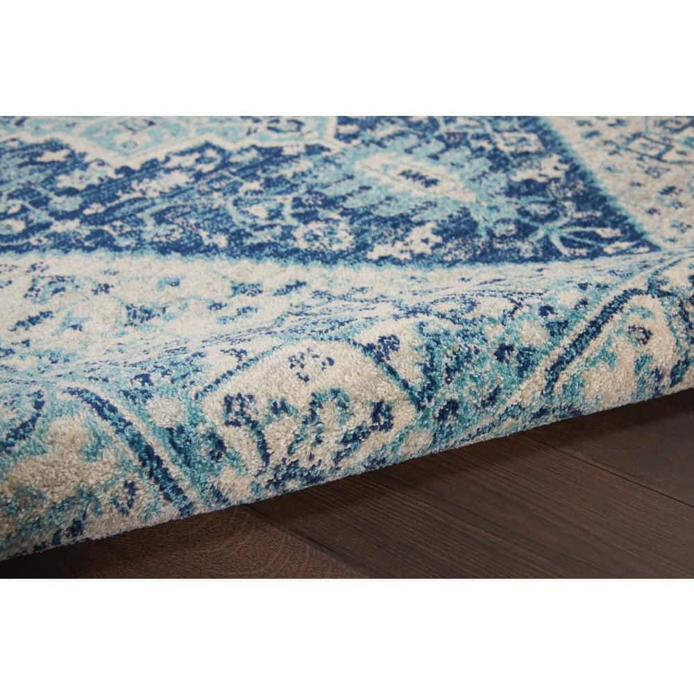 Ivory and Navy Synthetic 5' x 7' Rectangular Area Rug