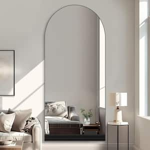 31 in. W x 71 in. H Full-Length Arched Wood Frame Wall Mirror with Striped Wooden Base in Black