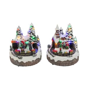 7.5 in. H B/O Lighted Christmas Musical Village with Moving Train with Timer (6/18hrs.) uses 3 AA Batteries (Set of 2)