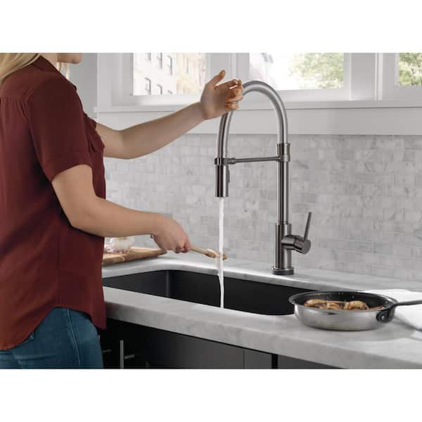 Trinsic Single Handle Pull Down Sprayer Kitchen Faucet with Touch2O Technology and Spring Spout in Black Stainless