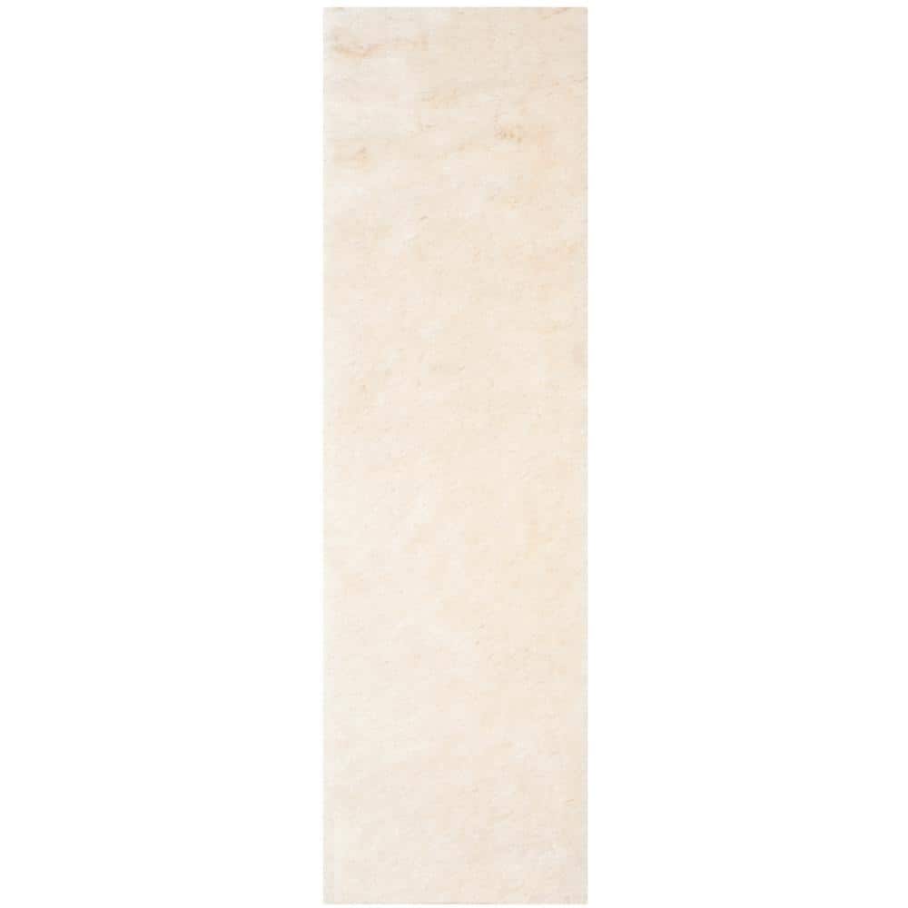 https://images.thdstatic.com/productImages/1b338748-bf31-4a25-8f7a-fdba85425cea/svn/ivory-safavieh-area-rugs-sg511-1212-210-64_1000.jpg