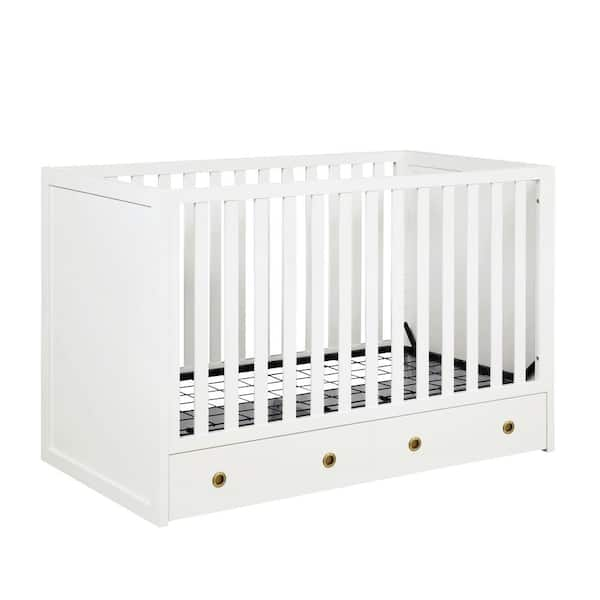 white crib with drawers