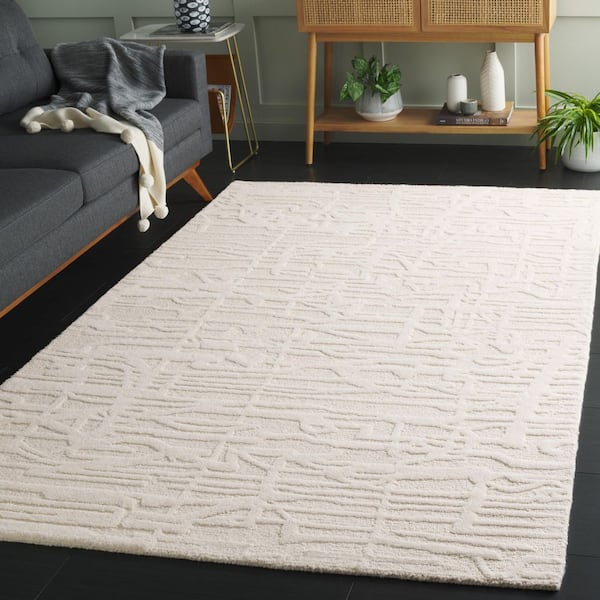 Ebony 5 ft. x 8 ft. Ivory Geometric Area Rug