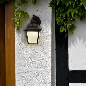 1-Light Aged Bronze LED Outdoor Wall Lantern Sconce with Frosted Glass and Dusk to Dawn Sensor
