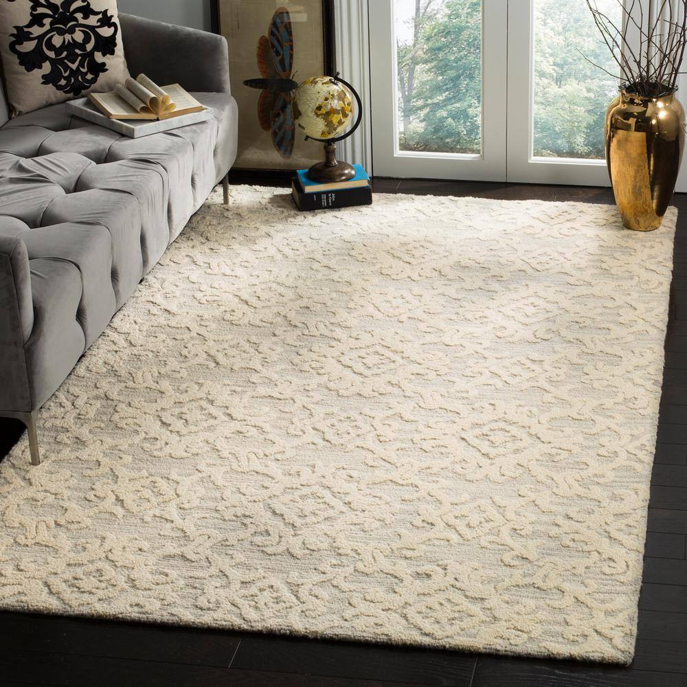 Handmade Gray Floral Round Wool Tufted Rug - 6' x 9'
