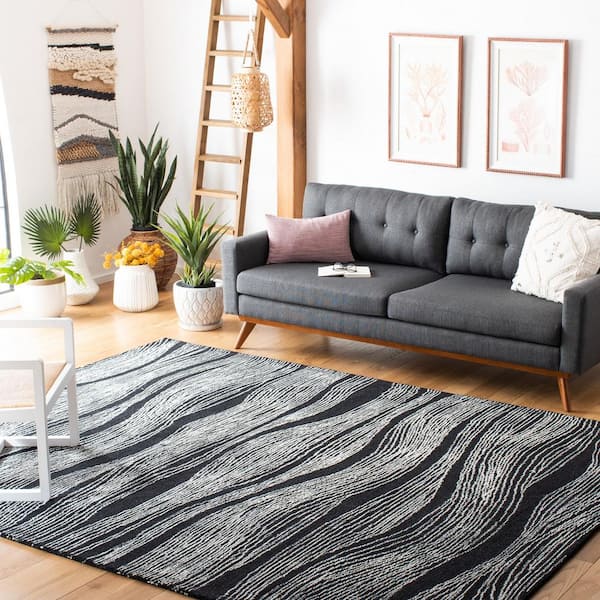 Metro 9 ft. x 12 ft. Black/Ivory Abstract Waves Area Rug