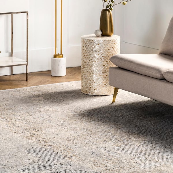 https://images.thdstatic.com/productImages/1b7c82cb-9462-4e55-8368-4217c925c8f6/svn/light-gray-nuloom-area-rugs-ercl01b-8010-76_600.jpg