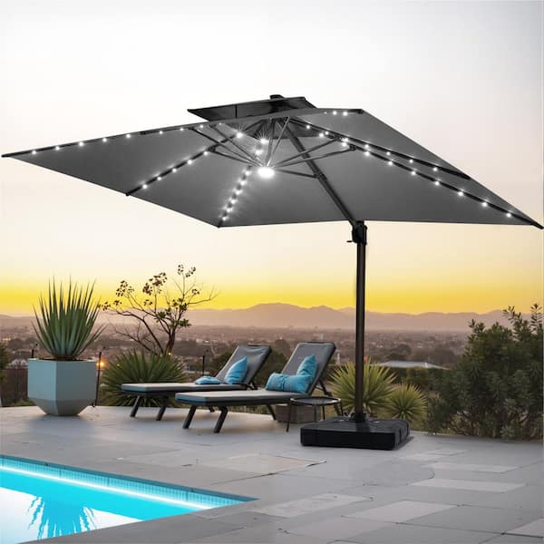 best gray patio umbrella with lights Pellebant 13.5 ft. x 10 ft. Double Top 360° Rotation Solar LED Lighted  Cantilever Patio Umbrella in Gray with 350 lbs. Base PB-B24WU86DGY