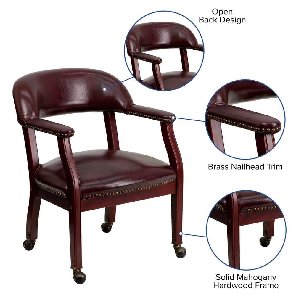 Elegant Oxblood Vinyl Conference Chair with Brass Nail Trim