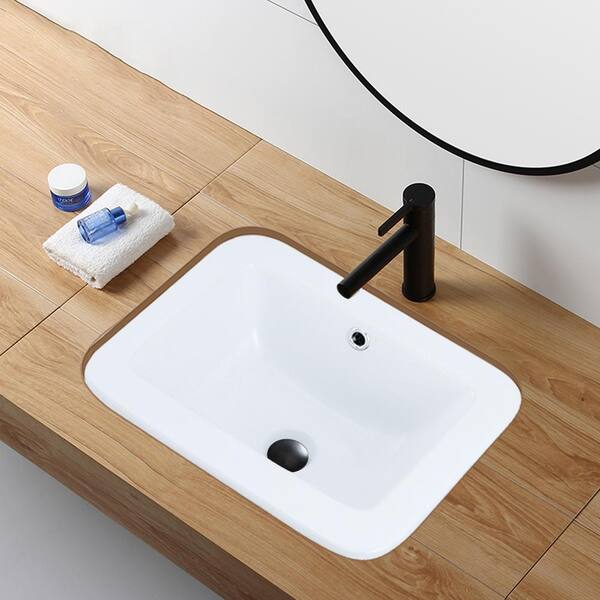 https://images.thdstatic.com/productImages/1b9e8320-473a-40f5-948b-3215b18f99a6/svn/white-satico-undermount-bathroom-sinks-ftt3181-c3_600.jpg