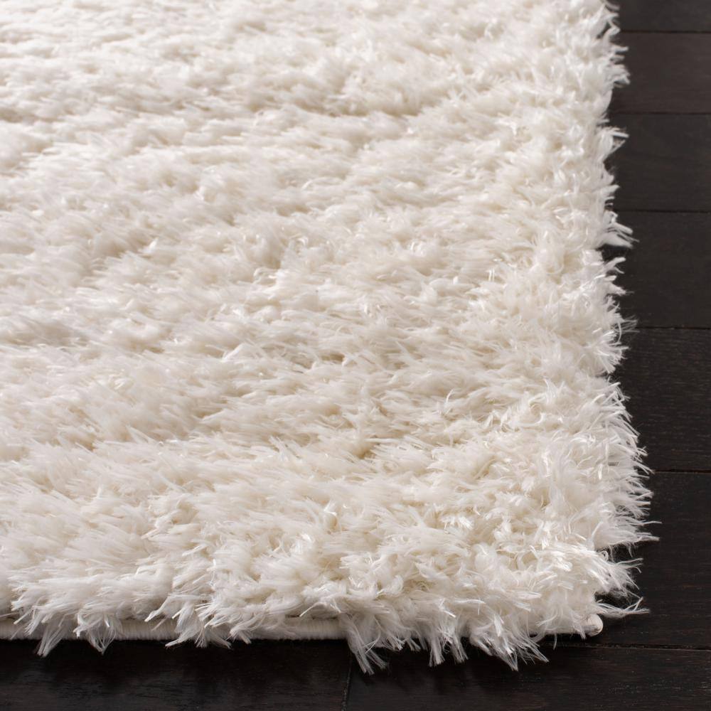Ivory Solid Shag 8' x 10' Wool and Synthetic Area Rug
