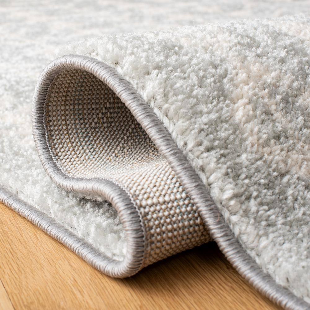 Ivory and Light Grey Wool Synthetic 9' x 12' Rectangular Area Rug