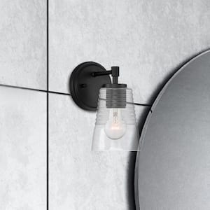 Ingo 5 in. 1-Light Matte Black Transitional Wall Sconce with Clear Ribbed Glass Shade for Living Rooms