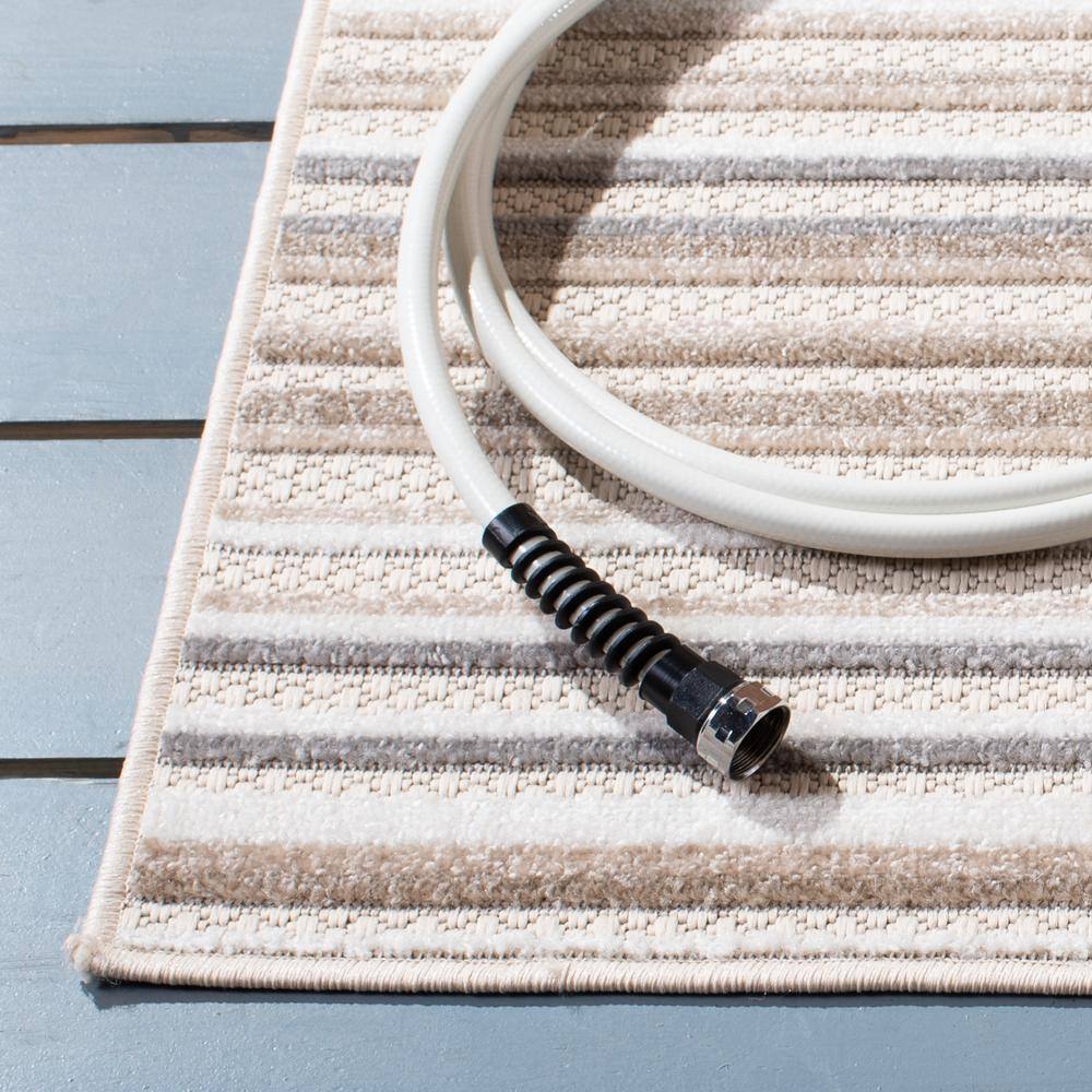 Ivory and Grey Geometric Reversible Synthetic Area Rug - 4'5" x 6'5"