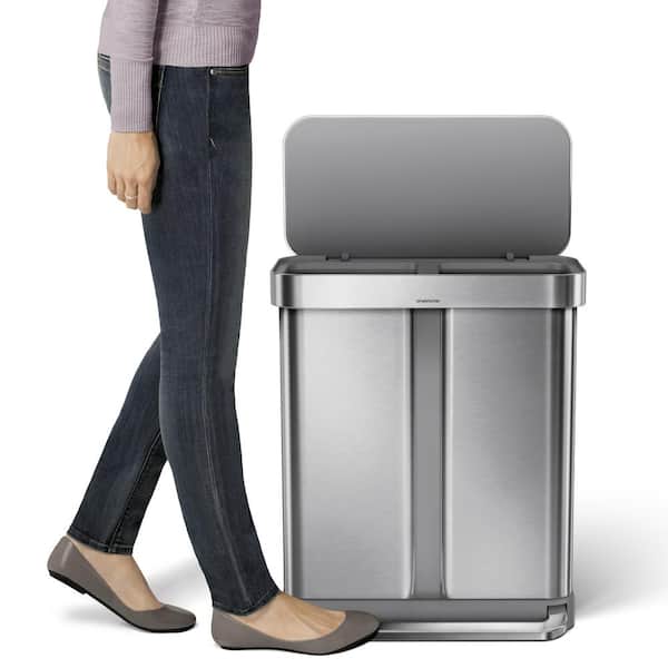 Simple human dual compartment trash bin.