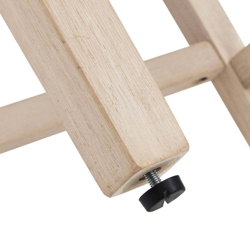 Close-up of the adjustable leveler on the bottom of the wooden stool leg.