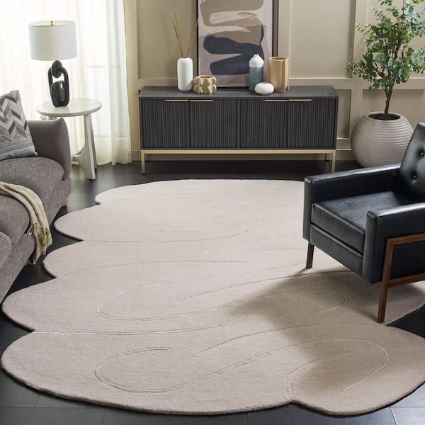 Novelty 8 ft. x 10 ft. Specialty Ivory Solid Swirls Area Rug