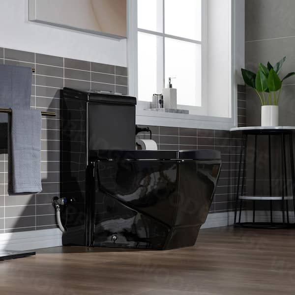 https://images.thdstatic.com/productImages/1bf4cde5-4f8c-49e5-b8fb-7c9bb97fd9cd/svn/black-with-chrome-button-woodbridge-one-piece-toilets-b0921-a0_600.jpg