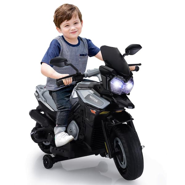 TOBBI 12-Volt Ride On Motorcycle Electric Dirt Bike for Kids with Training Wheels/Music Player/Headlights Silver