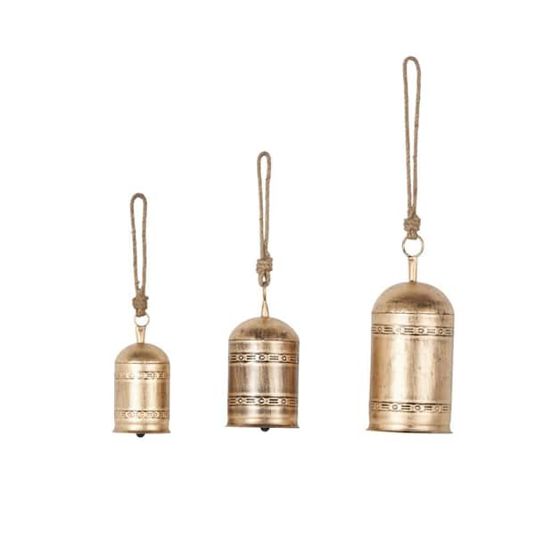 Litton Lane 5 in. x 10 in. Gold Metal Tibetan Inspired Cylindrical