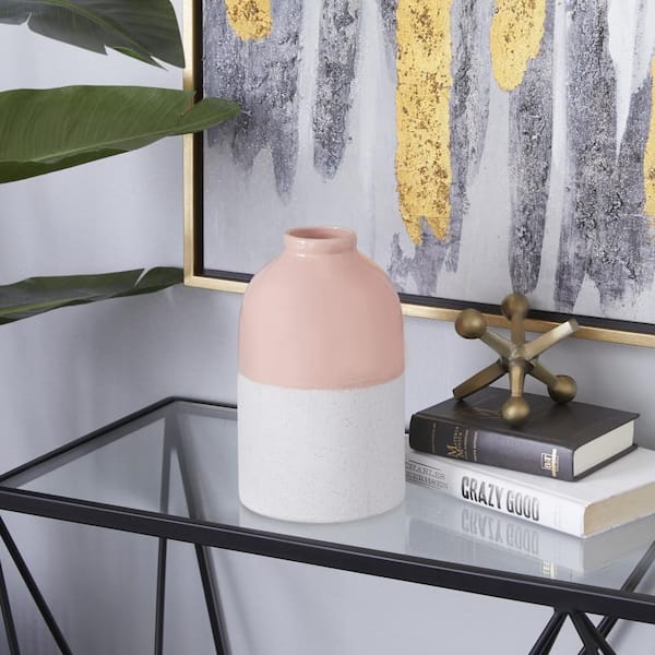 Litton Lane 10 in. Pink Stoneware Modern Decorative Vase