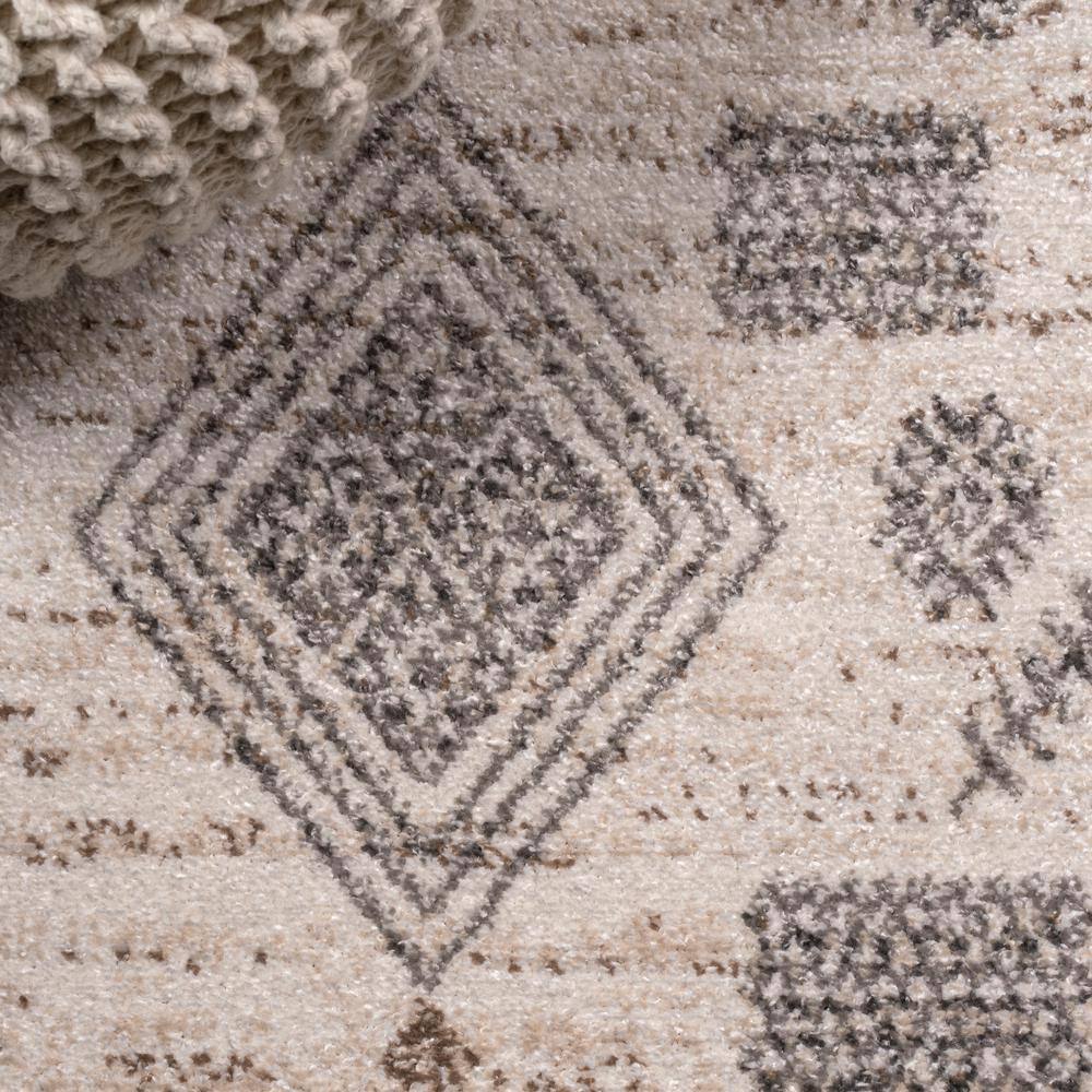 Bhalil 5' x 8' Gray and Beige Geometric Area Rug