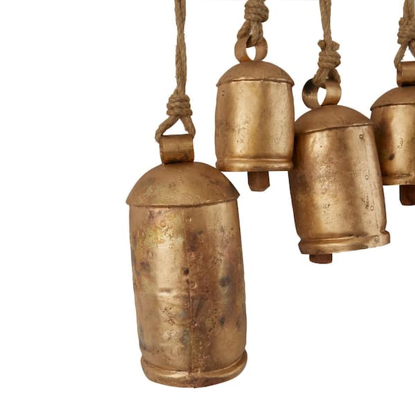 Litton Lane Gold Metal Tibetan Inspired Cylindrical Decorative Bell with  Jute Hanging Rope 042700 - The Home Depot