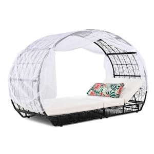 Black Wicker Outdoor Day Bed with Beige Cushions, Colorful Pillow and Curtain