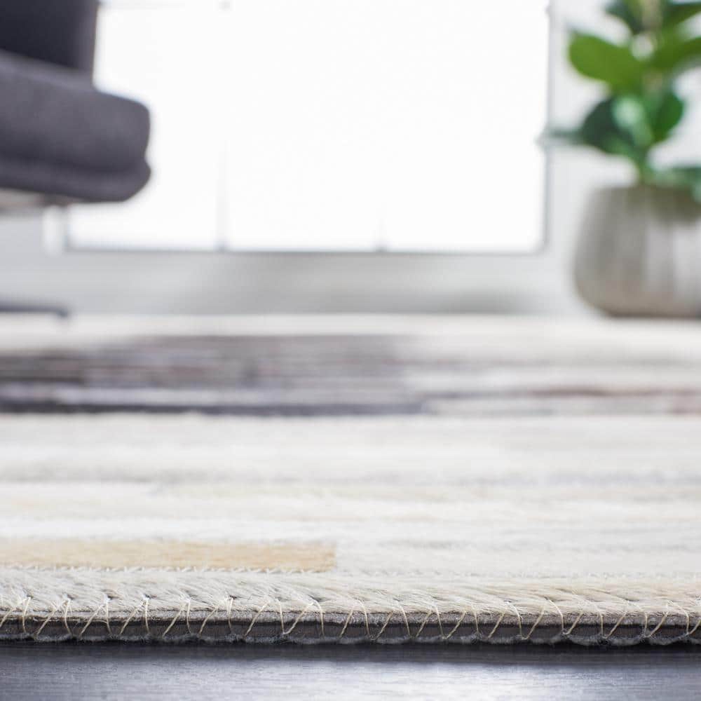 Handmade Gray and Brown Geometric Cowhide Area Rug
