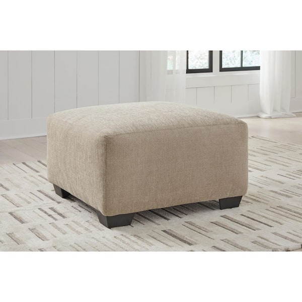 Signature DESIGN BY ASHLEY Brogan Bay Beige Polyester Square Cocktail Medium Ottoman