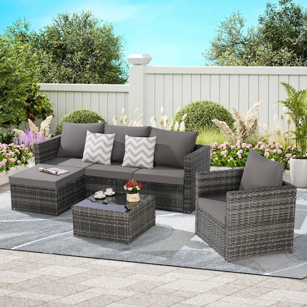 Zeus & Ruta 3-Piece Patio Wicker Conversation Set with Single Sofa Dark Gray Cushions and Coffee Table for Backyard