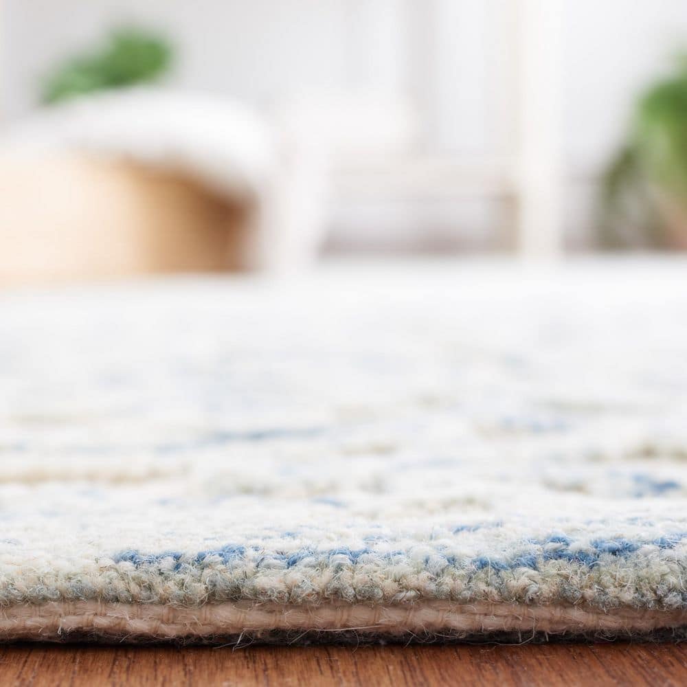 Handmade Abstract Tufted Wool Area Rug 9' x 12' in Blue