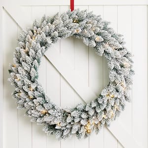 36 in. D Pre-Lit Snow Flocked Artificial Christmas Wreath with 60 Nine Functional White/Multi-color LED Light