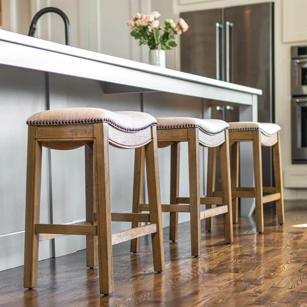 Adrien Brown Backless Saddle Wood Counter Stool