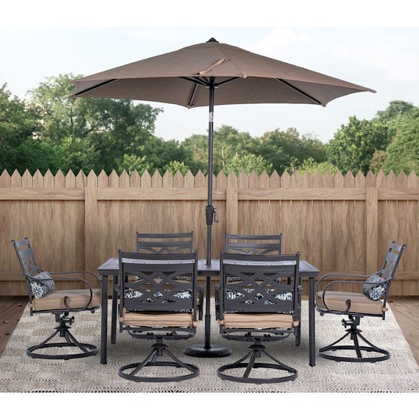 Hanover Montclair 7-Piece Steel Outdoor Dining Set with Tan Cushions, 6 Swivel Rockers, 40 in. x 66 in. Table and Umbrella