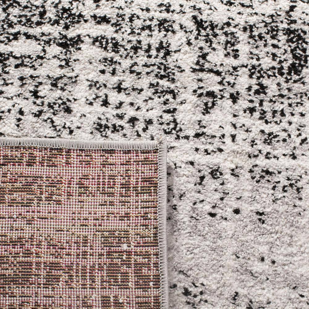 Chic Silver and Black Synthetic 30" Easy-Care Runner Rug