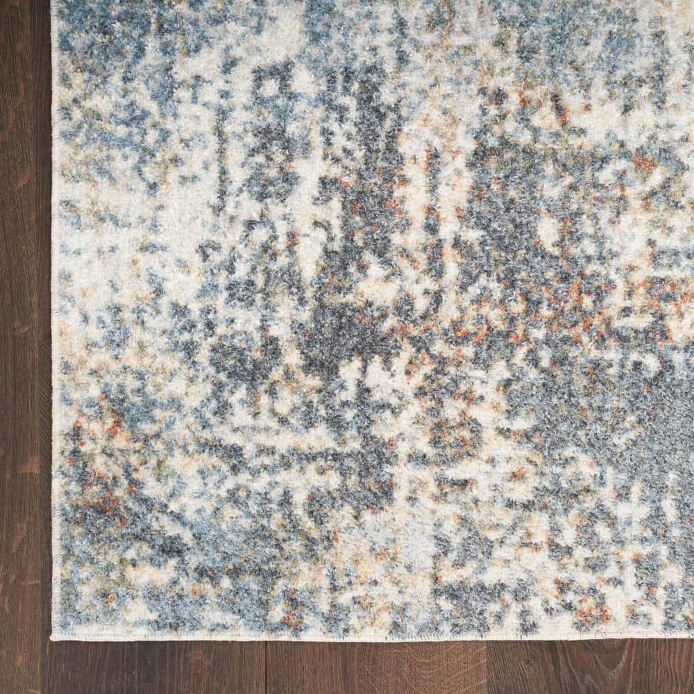 Ivory Abstract Synthetic 3'3" x 5' Easy-Care Area Rug