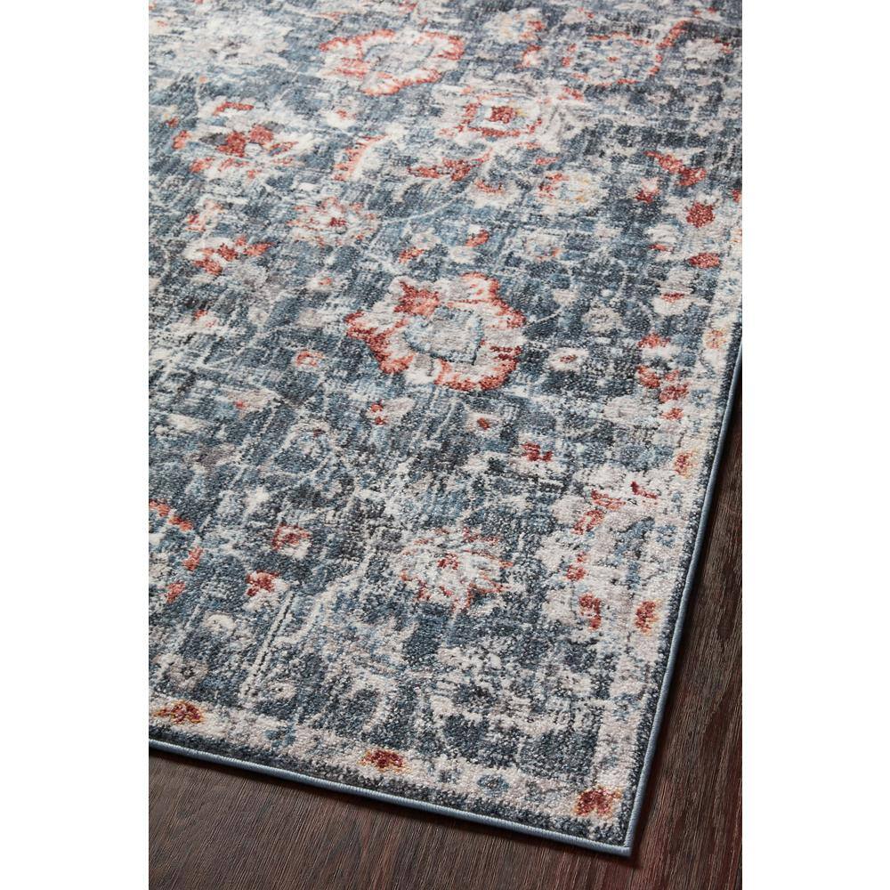 Cassandra Blue and Rust Stain-Resistant Synthetic Area Rug