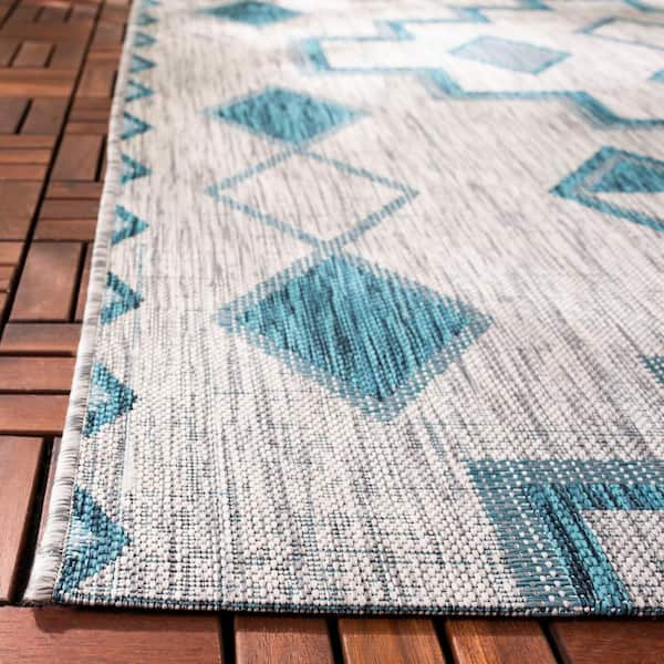 https://images.thdstatic.com/productImages/1c9498f6-454e-4470-ae60-da5c224b59f5/svn/gray-teal-safavieh-outdoor-rugs-cy8533-37212-6-c3_600.jpg