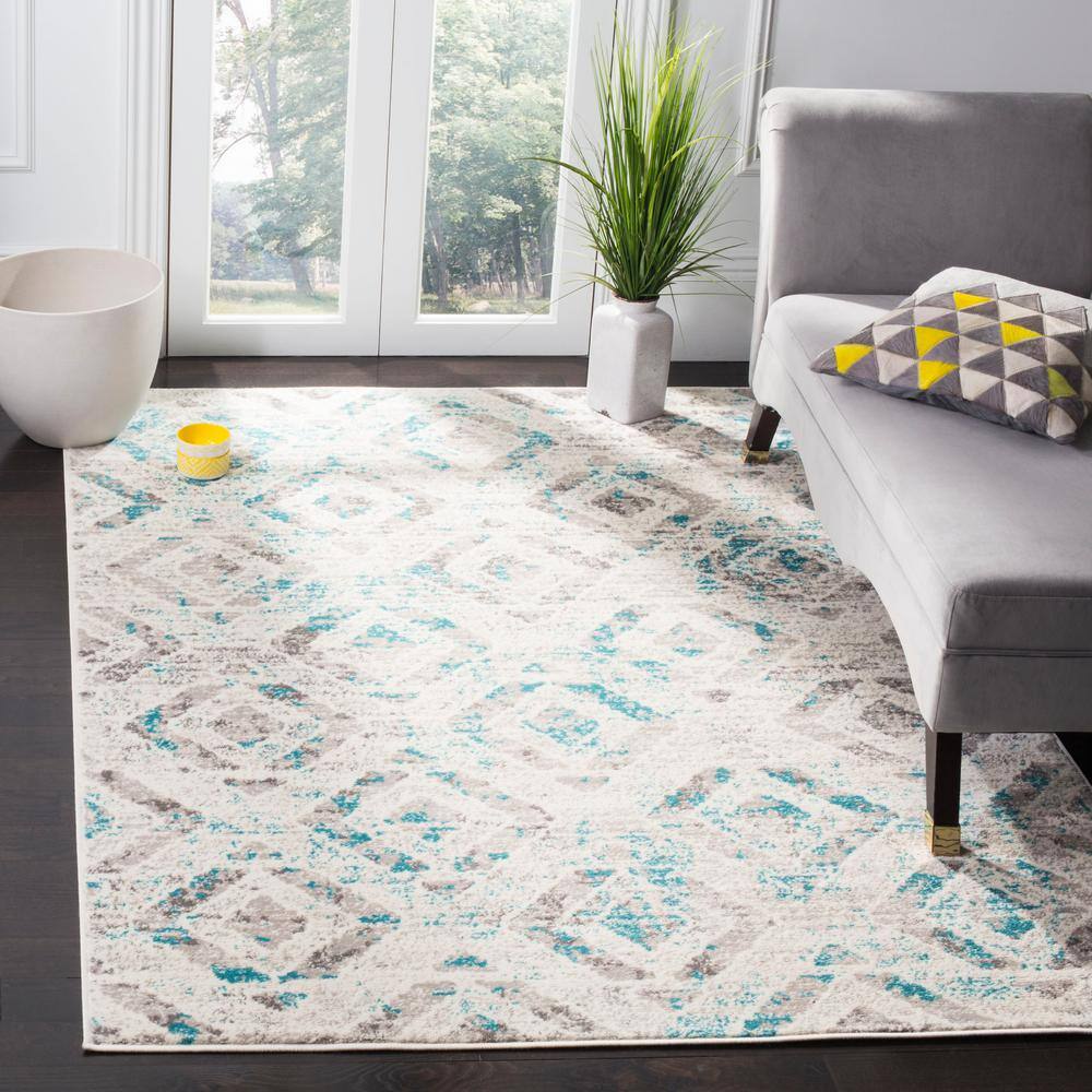 Ivory and Blue Medallion 6' x 9' Synthetic Area Rug