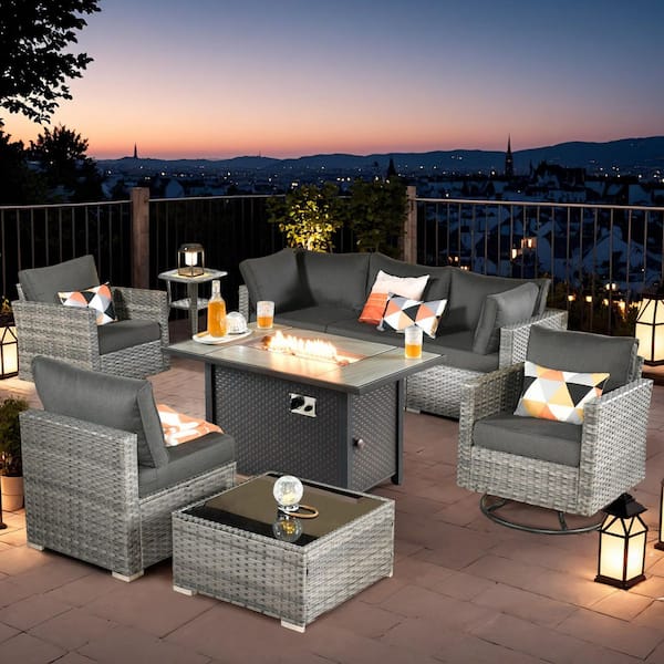 XIZZI Clove 9 Pieces Wicker Outdoor Patio Rectangular Fire Pit Set and Swivel Rocking Chairs with Black Cushions