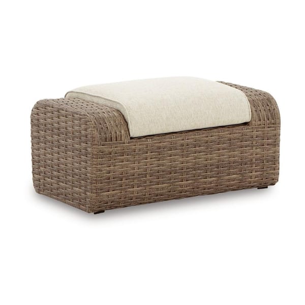 Benjara Julia Brown Resin and Wicker Outdoor Ottoman with Beige Fabric Cushion