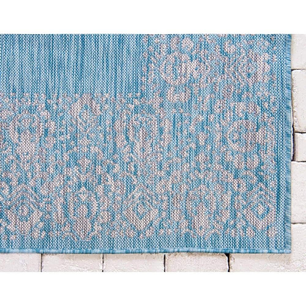 Aqua Floral Bliss Easy-Care Synthetic Outdoor Rug 7'1" x 10'