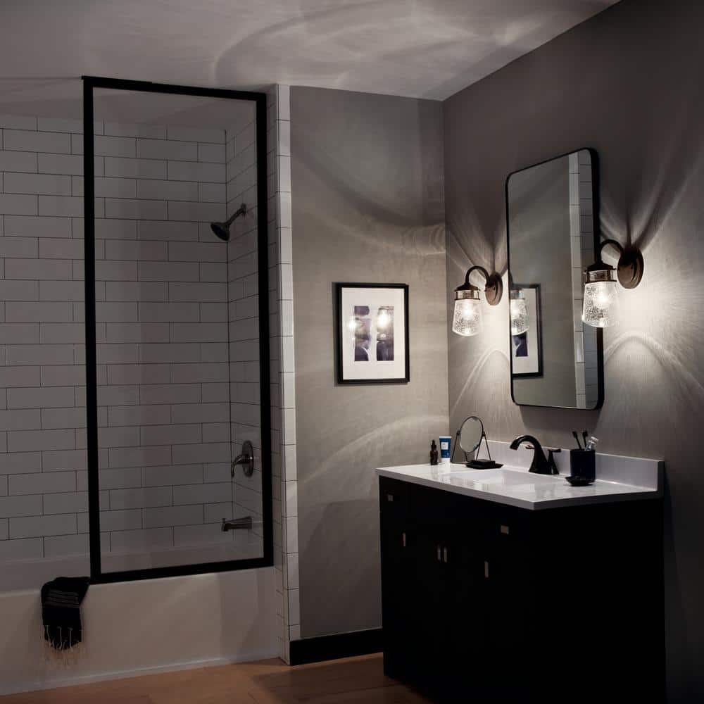 Lyndon 11.25" Bronze and Clear Seeded Glass Wall Sconce