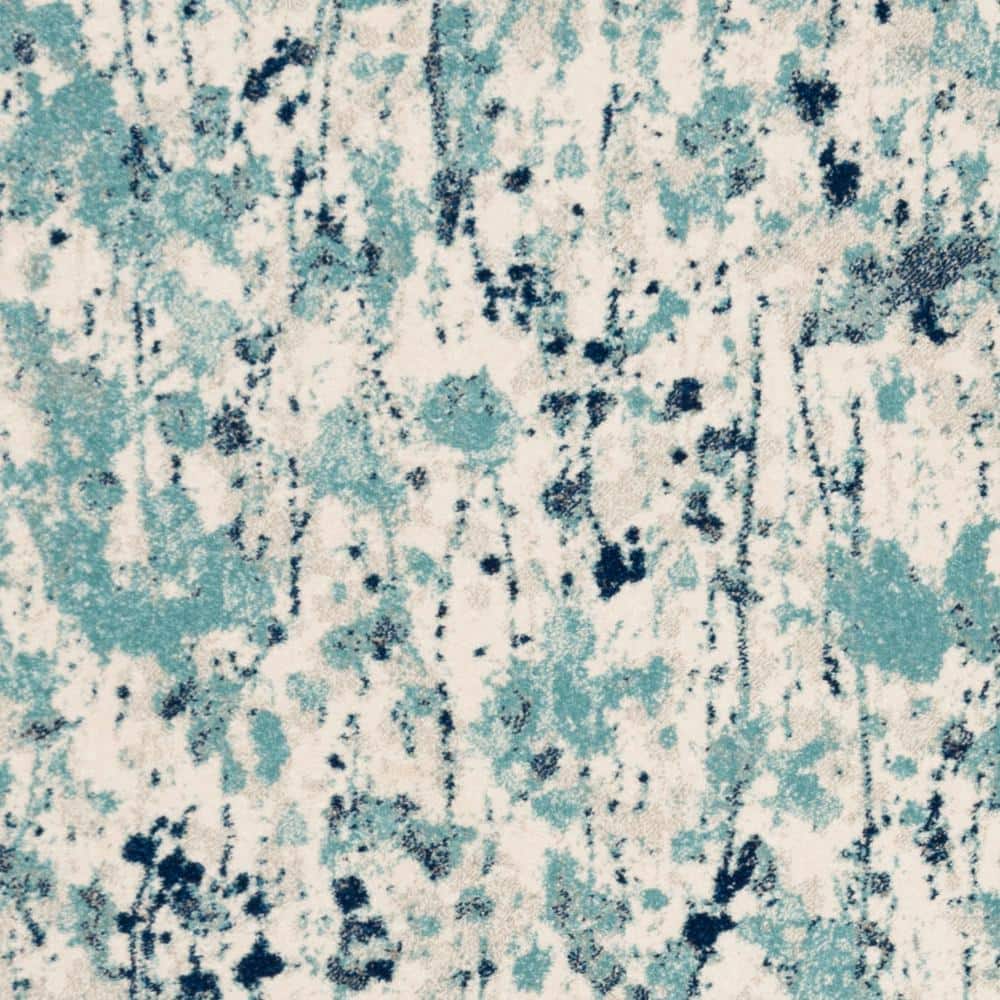 Ivory and Blue Abstract Floral 8' x 10' Area Rug