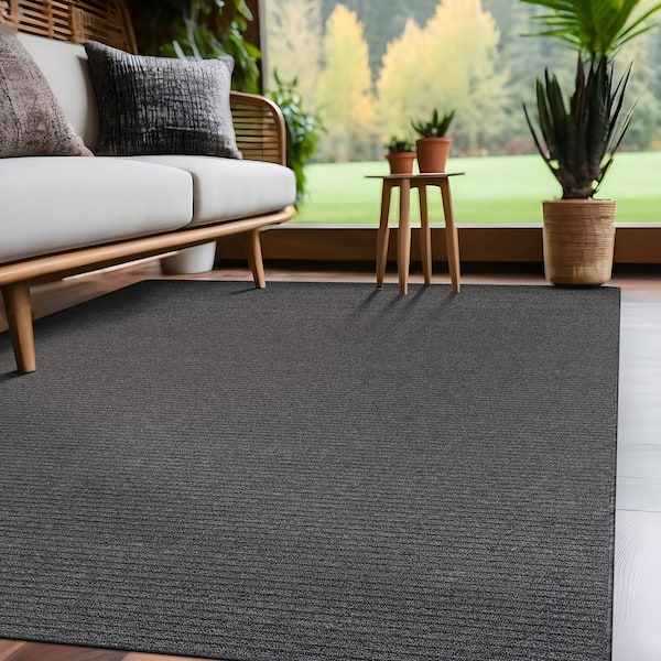 Oasis Solid Gray 6 ft. x 9 ft. Non-Slip Rubber Back Indoor Area Rug