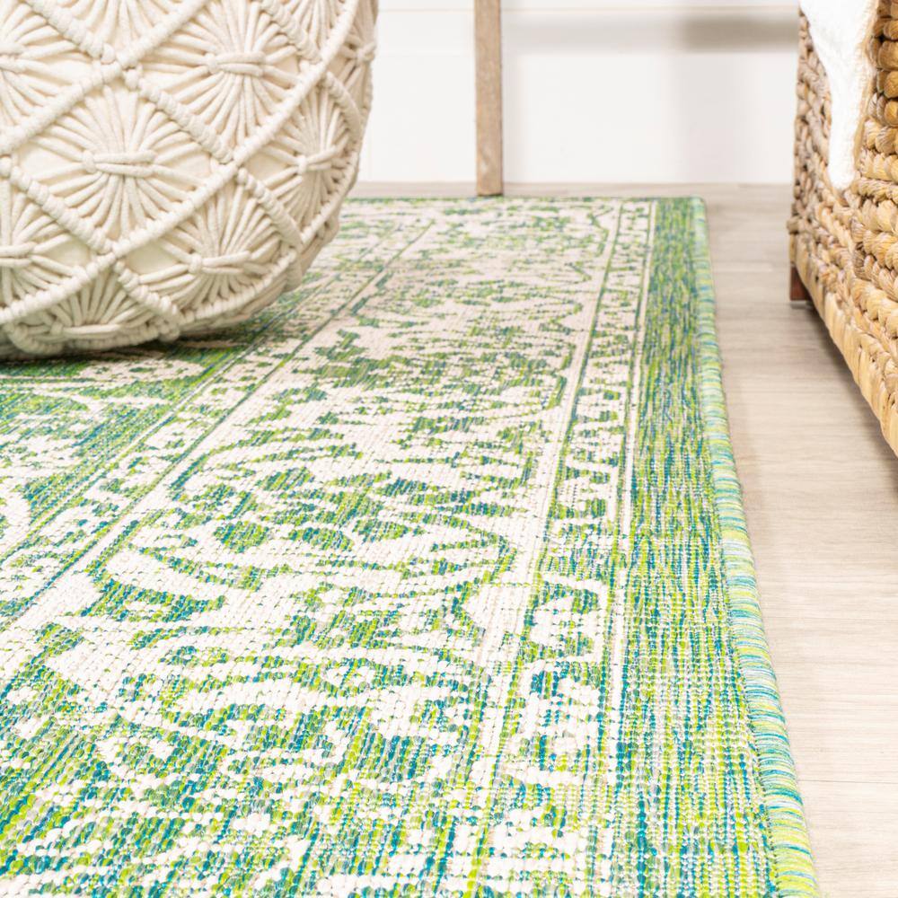 9' x 12' Green and Cream Floral Synthetic Rectangular Area Rug