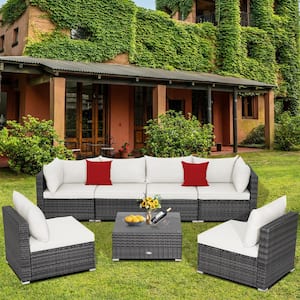 7-Piece Outdoor Wicker Patio Conversation Set with White Cushions and Pillows