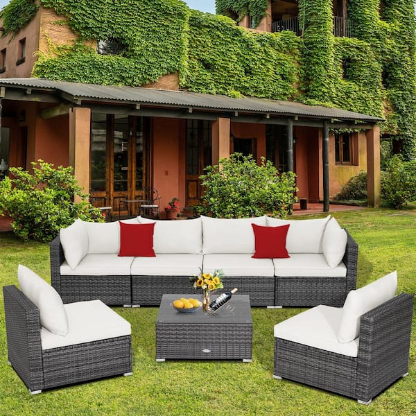 Liviza 7-Piece Outdoor Wicker Patio Conversation Set with White Cushions and Pillows